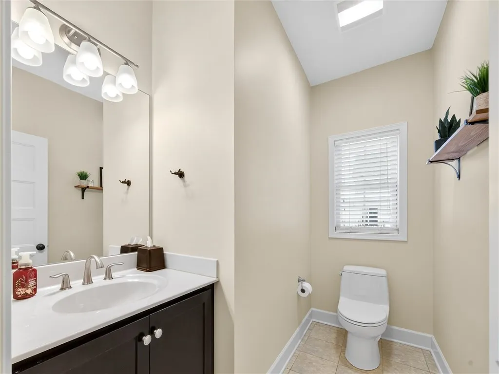 Half Bath off of Mud Rm and Garage