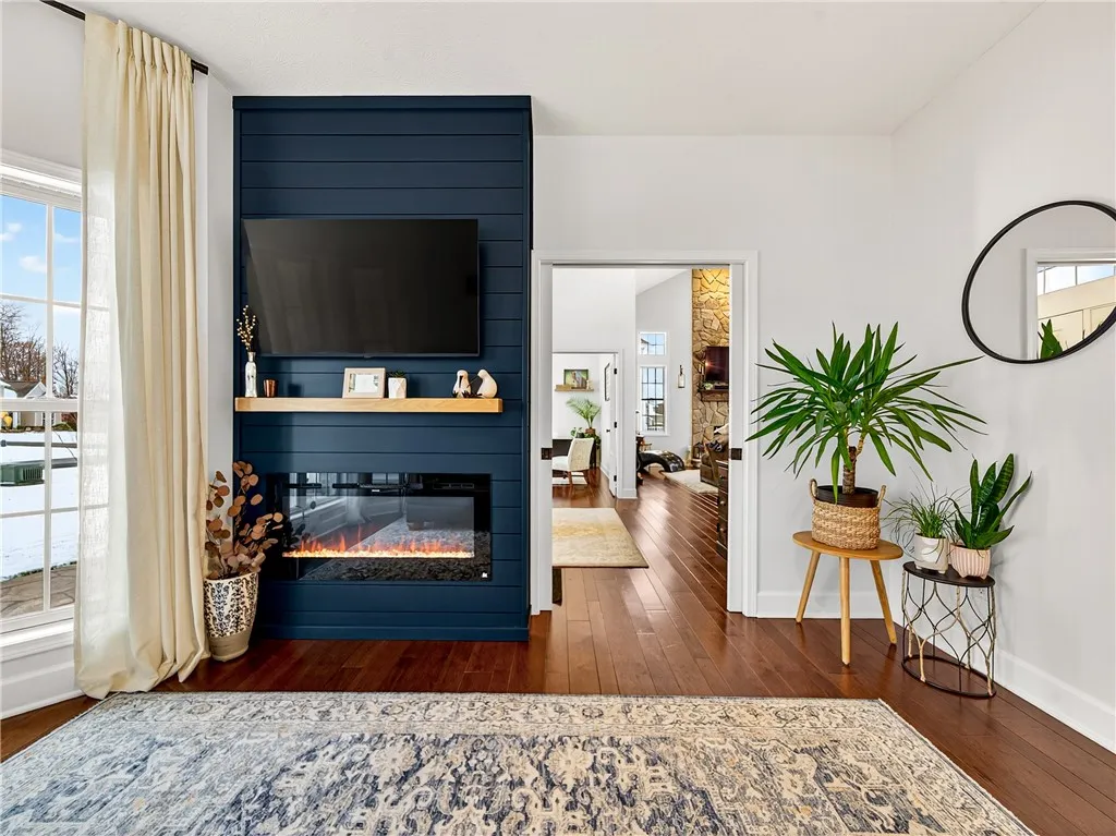 Feature Wall w/Electric FP and Pocket Doors to foyer