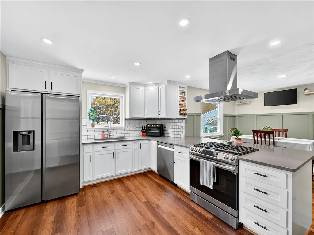 Updated Kitchen with Quartz Countertop and Breakfast Bar