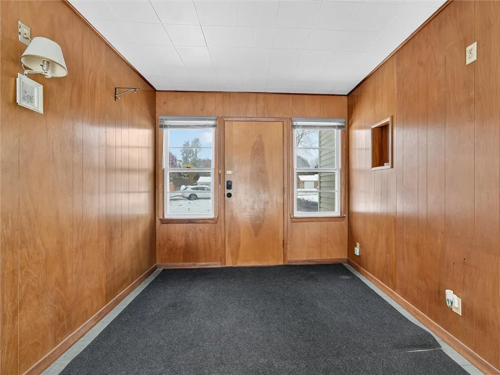 Breezeway with access to the Home, garage and Sliding Glass Door to Backyard