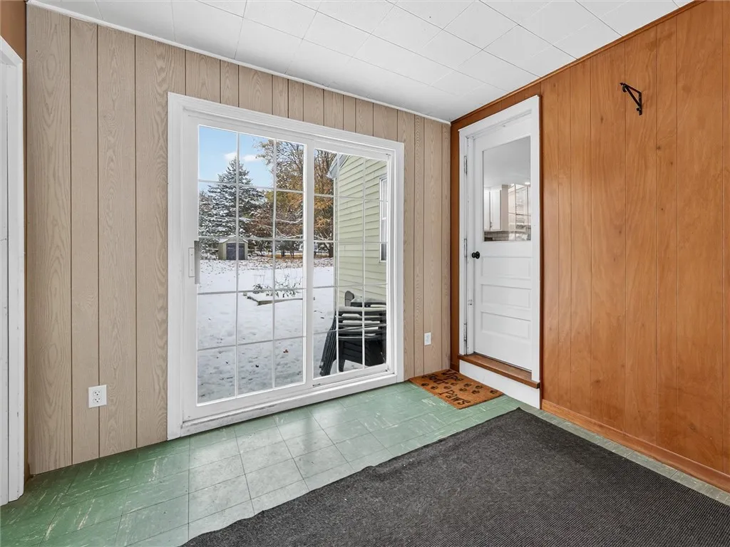 Breezeway with access to the Home, garage and Sliding Glass Door to Backyard