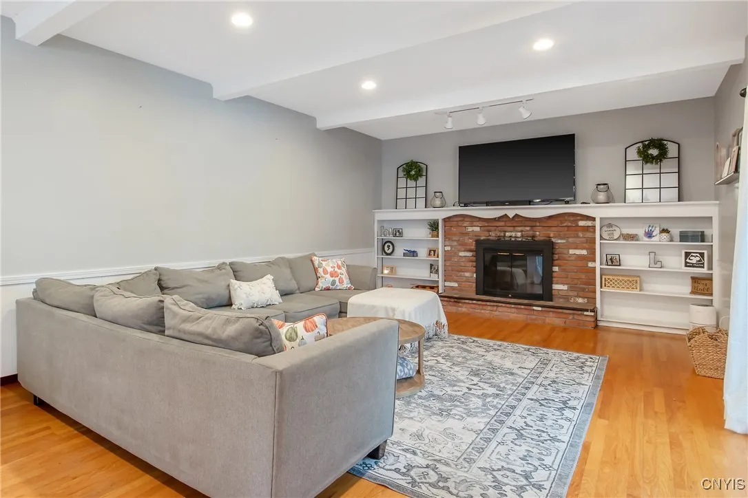 Family room with wood burning fireplace
