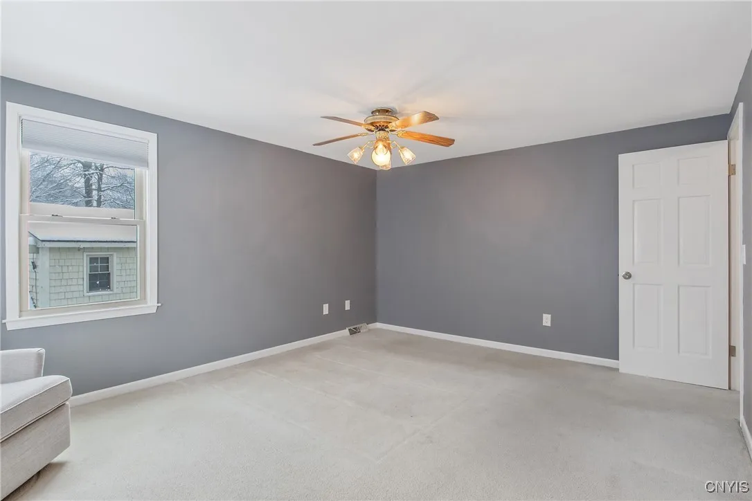 Primary bedroom with full bath