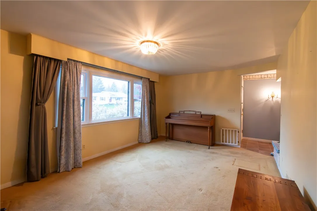 Living room is separate from the entertaining area