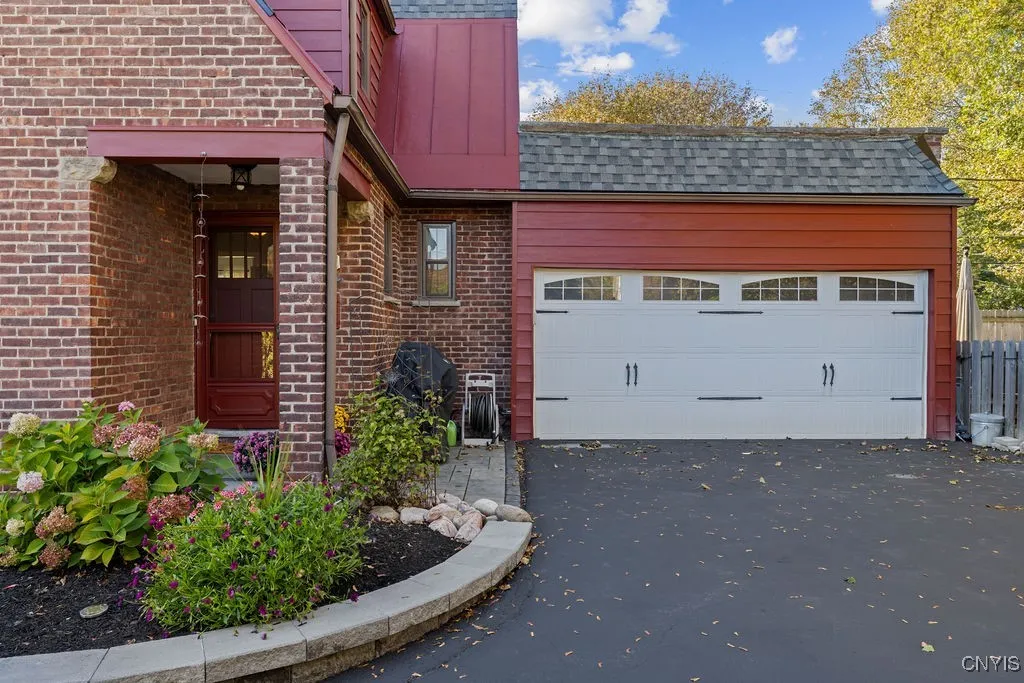 The side entrance that is the entrance the sellers use. The two car garage leads you into the laundry and utility room.