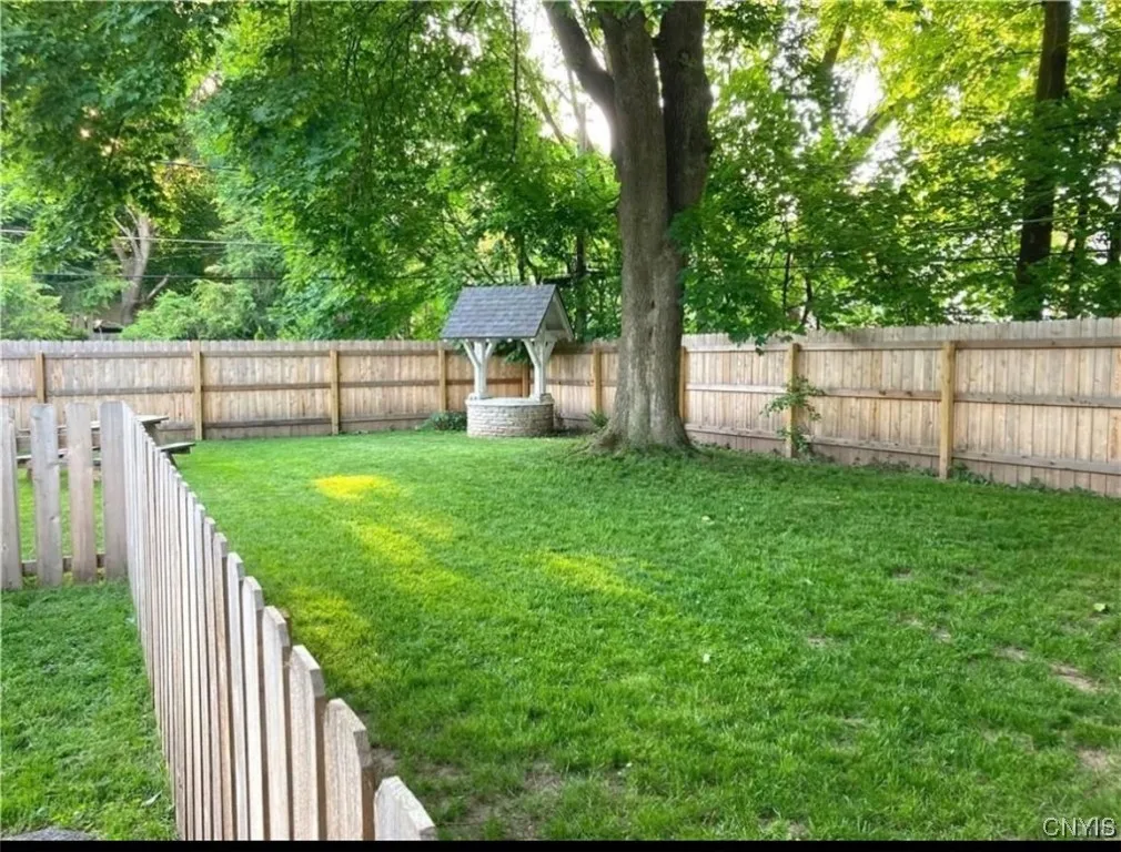 Beautiful backyard that is fully fenced in.