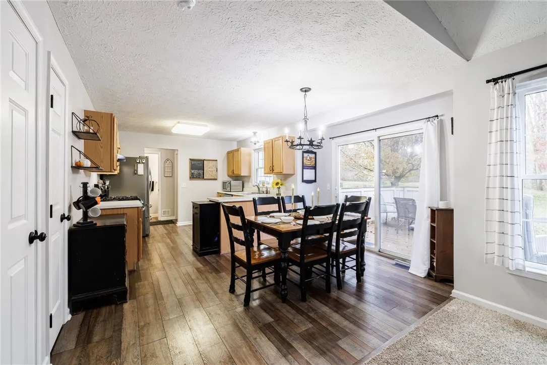 dinette area with beautiful nature views wide open to allow large gatherings for Thanksgiving or anytime