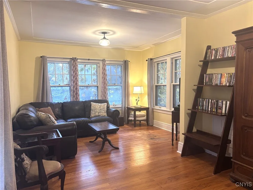 Back Bedroom #2being used as a Lounging Room that could be part of a Suite with The Master Bedroom .