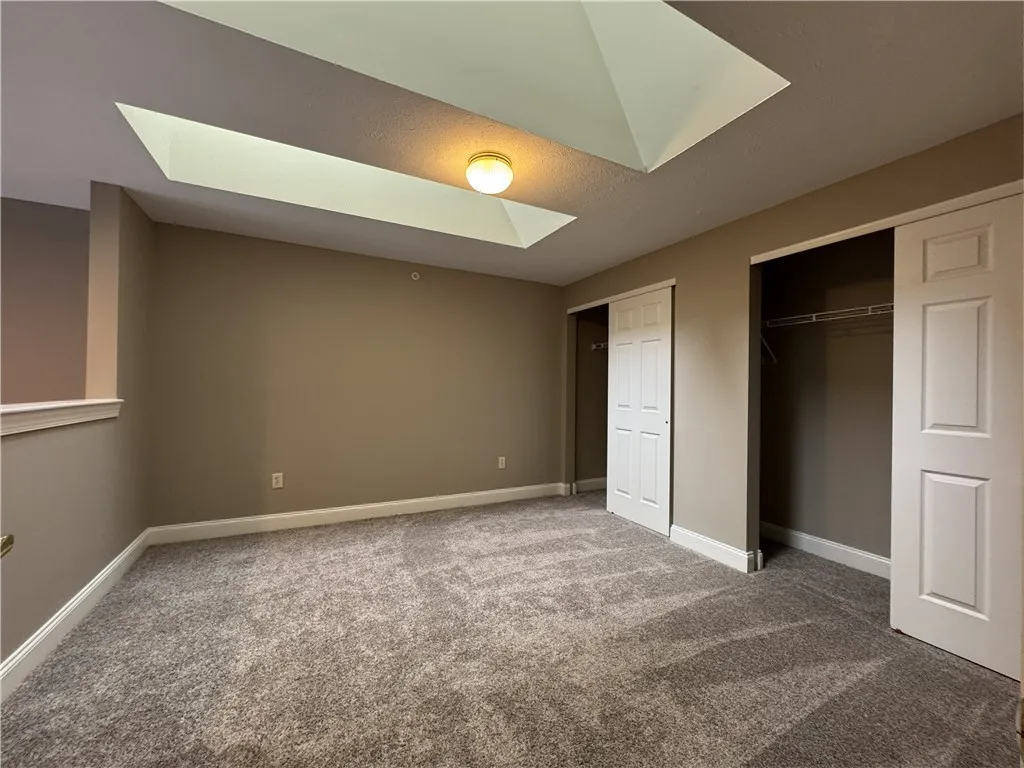 Typical large loft area with skylights and large closet