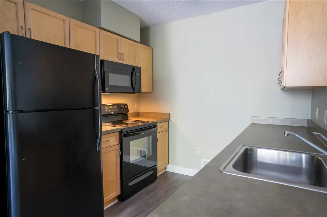 Typical kitchen in a 1-bedroom, 1.5-bath apartment