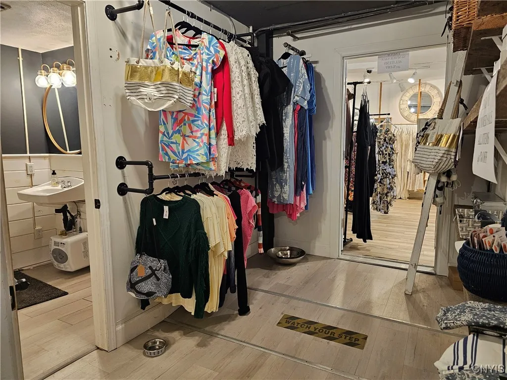 Hallway and bath- shared by both storefronts