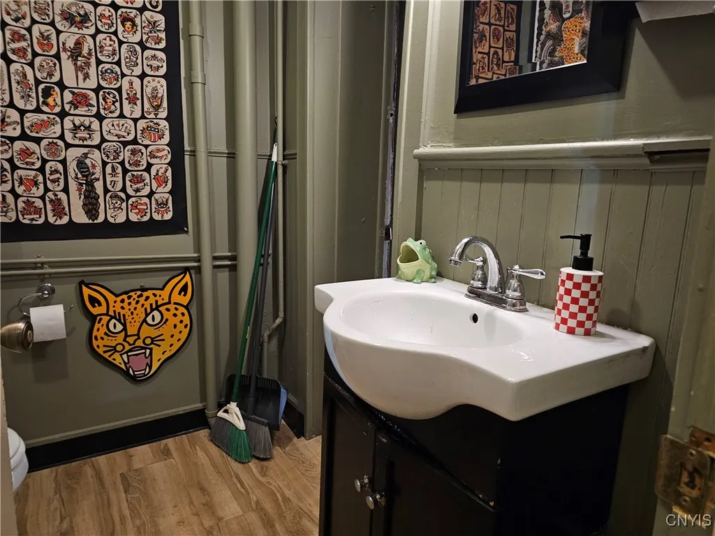 Bathroom off Tattoo room and leads to 2nd floor inside hallway