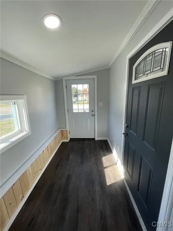 Front Porch Entryway hallway with Exterior door and door to Living room