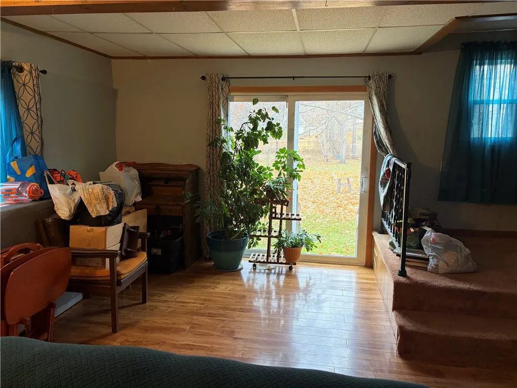 Large living room with sliding door to back yard