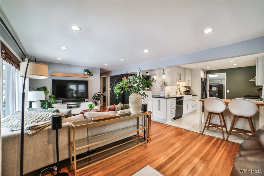 There is an open floor plan to the living space from the living room to the kitchen and dining room- great for entertaining and gathering.