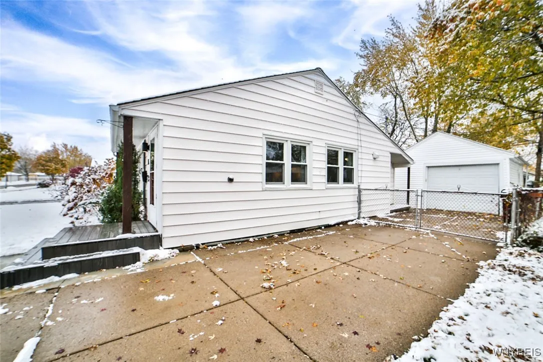 There is lots of parking space in the concrete drive