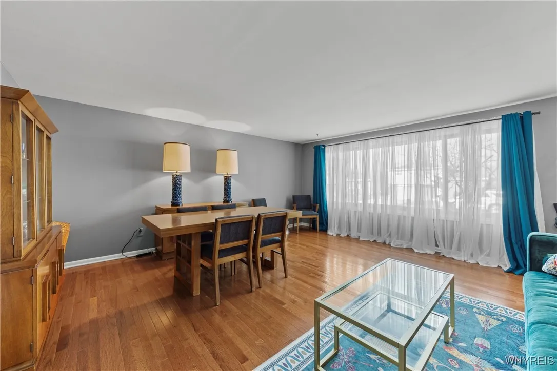Spacious living room with gleaming hardwood floors