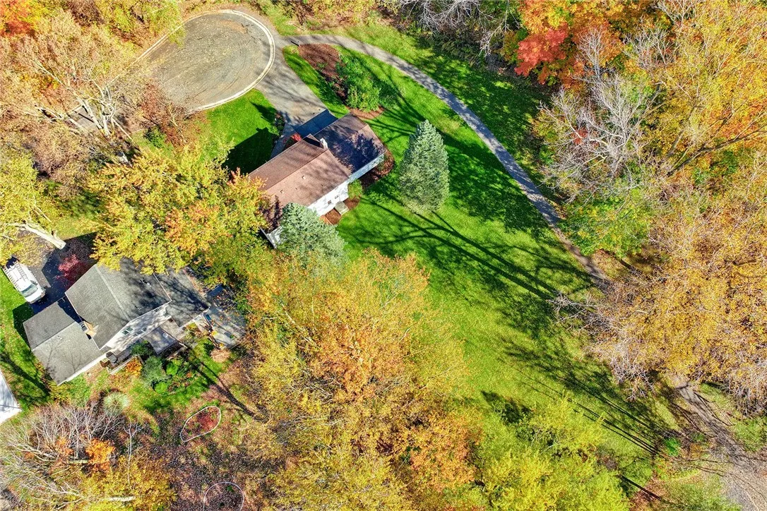 Rare privacy as privacy adjoings wooded Milton Case Park for access to trails