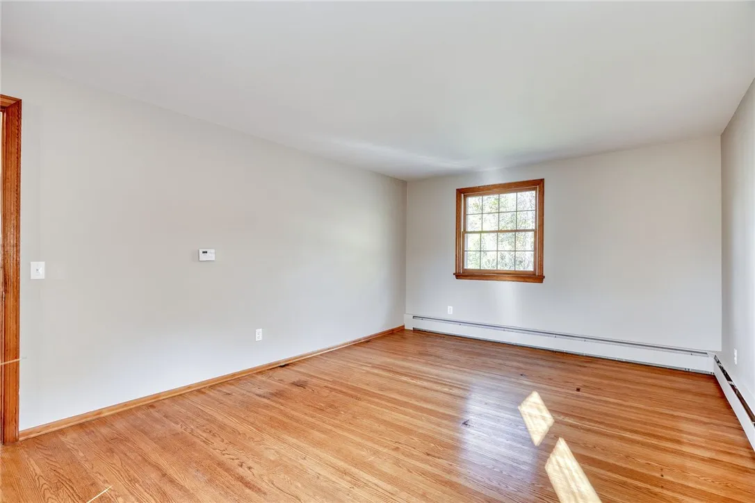 Primary Bedroom with hardwood floors and 2 closets!