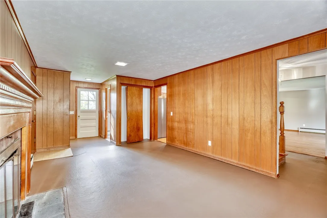 Family Room with wood burning fireplace (coveys as-is)