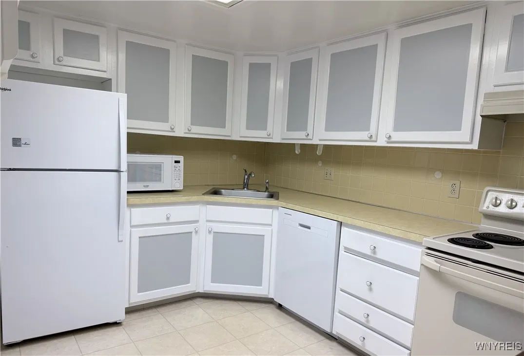 Kitchen Appliances include Refrigerator, Microwave, Dishwasher and Electric Stove
