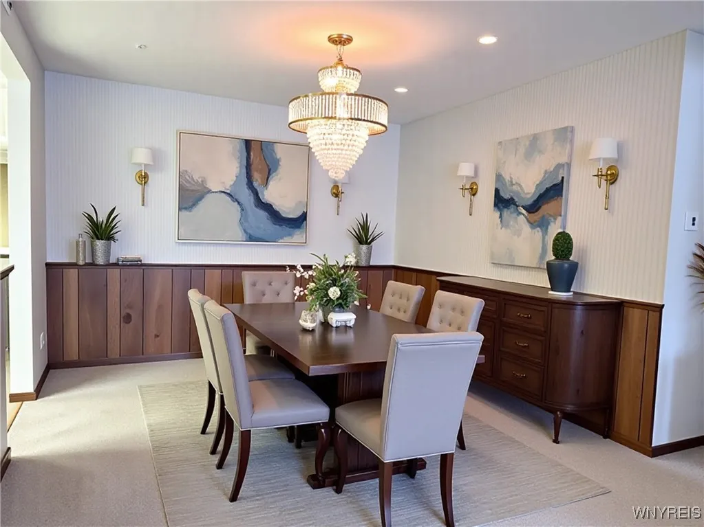 Dining Room AI Staged. The back wall is half paneled, not a shelf.  Light Fixture is also AI Staged