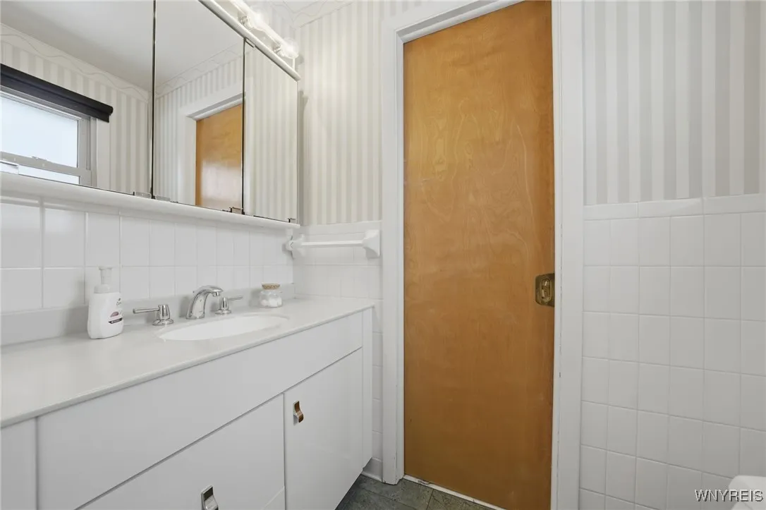 Half bath has double entry access