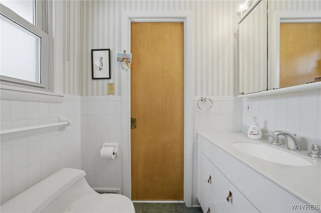 Half bath has double entry access