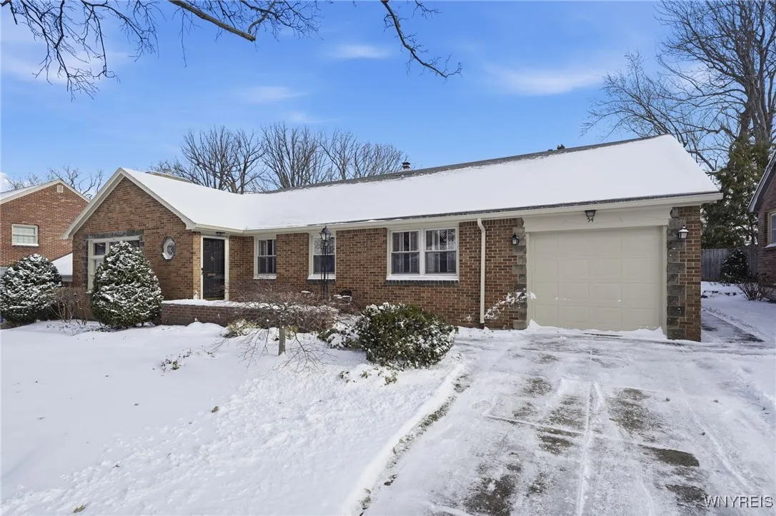 Snyder Brick Ranch with concrete driveway
