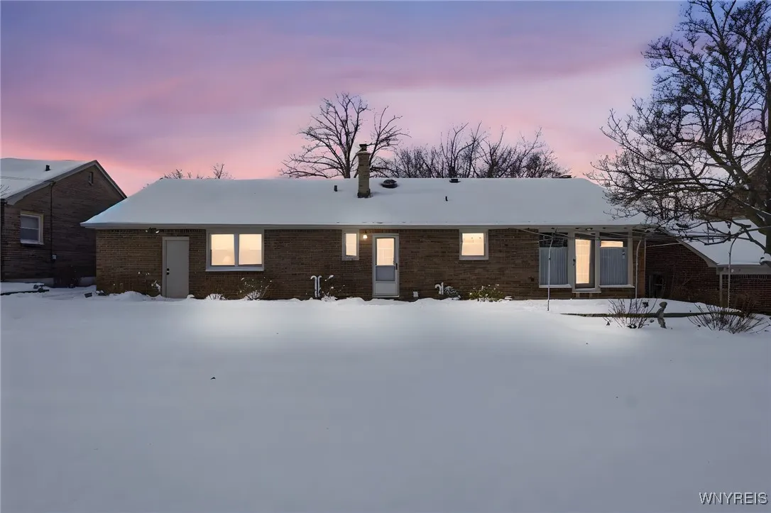 Sunset view of rear of house