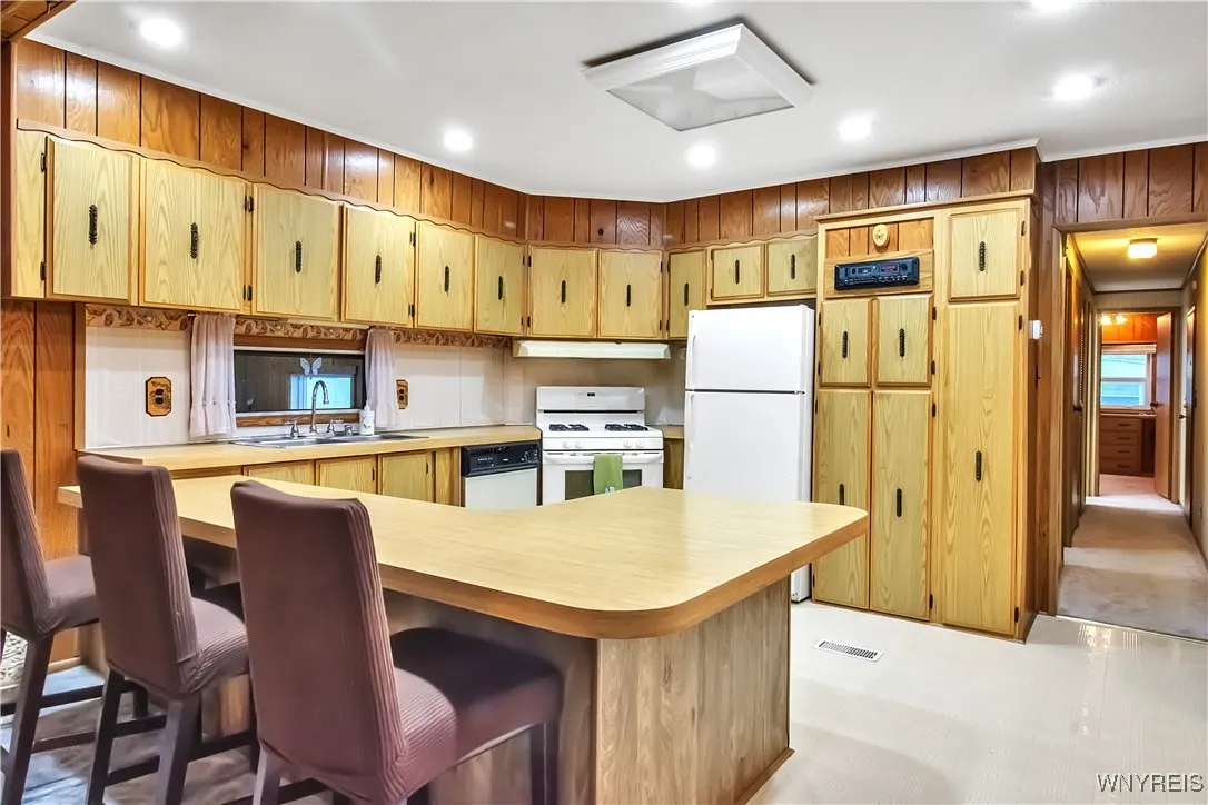 Kitchen has 2 tiered counter tops