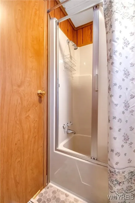 Bathtub surround in primary front bedroom