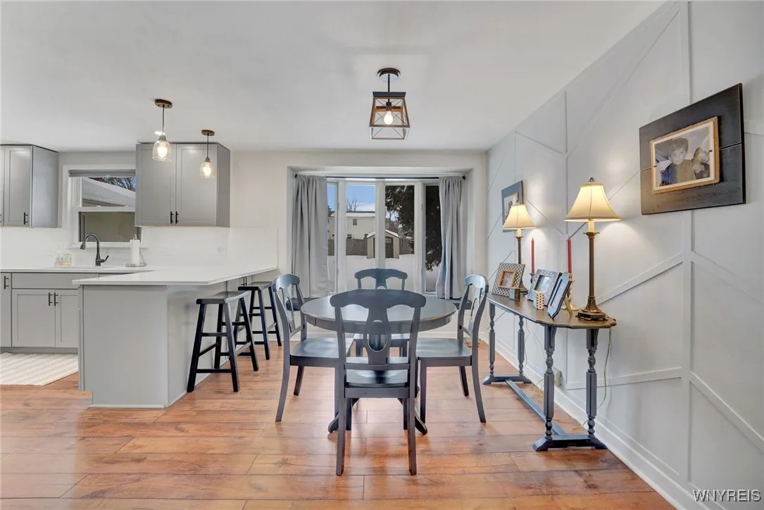 REMODELED KITCHEN WITH TRENDY LIGHT GREY CABINTRY WITH QUARTZ COUNTERS AND FULLY APPLIANCED!