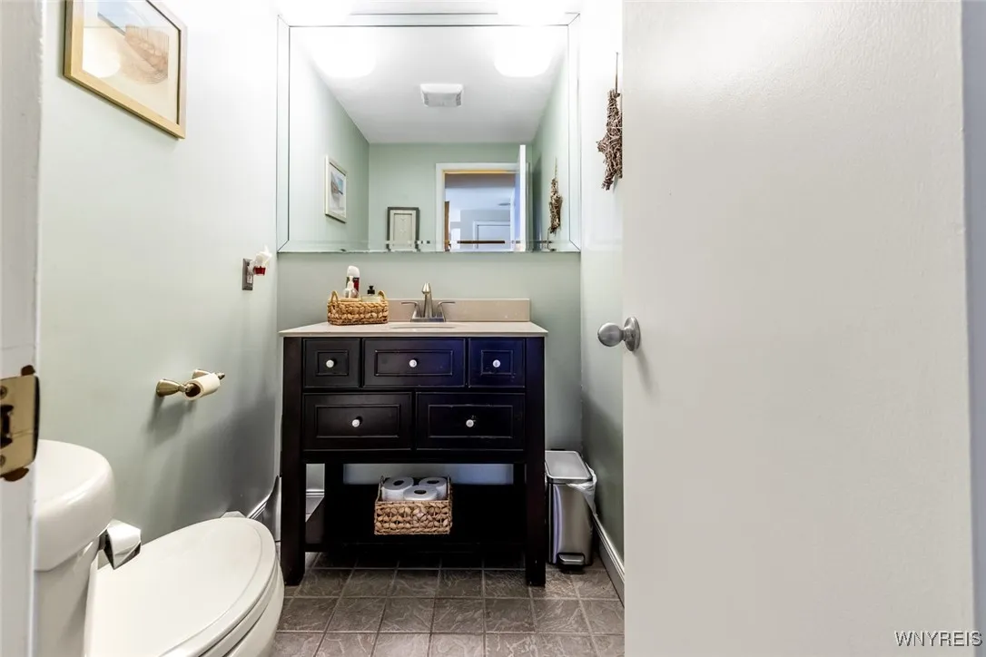 Attractive, convenient updated first floor half bath.