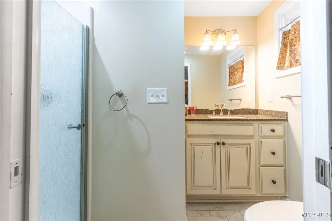 Primary bathroom with walk in shower.
