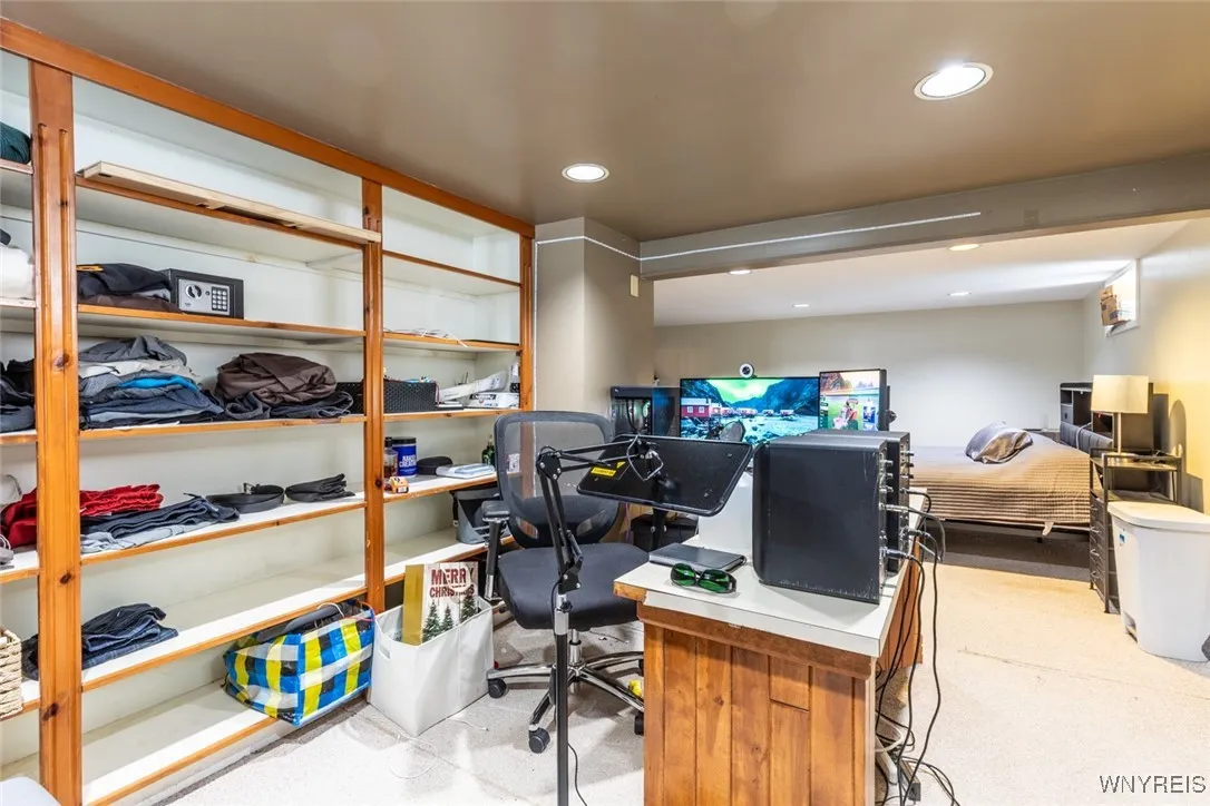 Lots of room for storage or collectables with built in shelving in the basement.