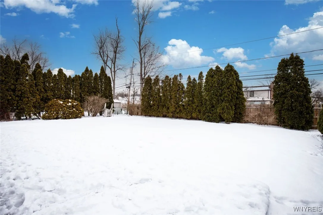 There is an in ground pool under this snow waiting to be enjoyed in the Summertime! New safety elephant cover for the pool in 2024.