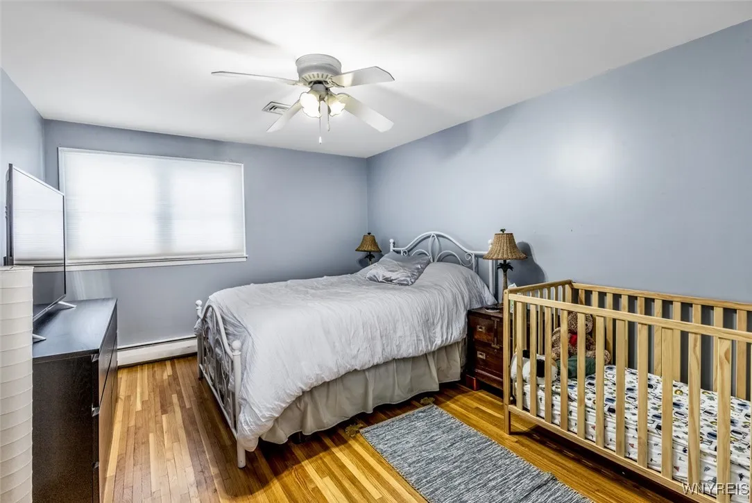 Second bedroom - more beautiful hardwood floors.