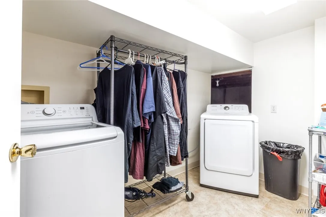 Separate laundry area in the basement. washer and dryer stay.