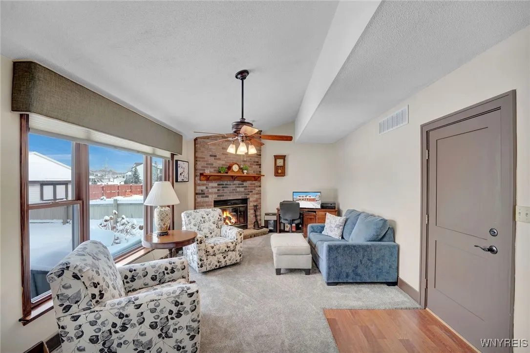 FAMILY ROOM OFF KITCHEN-ANGLED CATHEDRAL (SHED STYLY)
