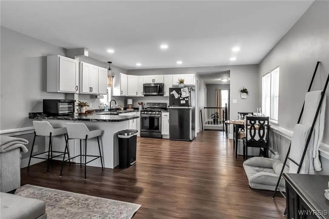 Upper Unit: Open Concept LR, DR and Kitchen!