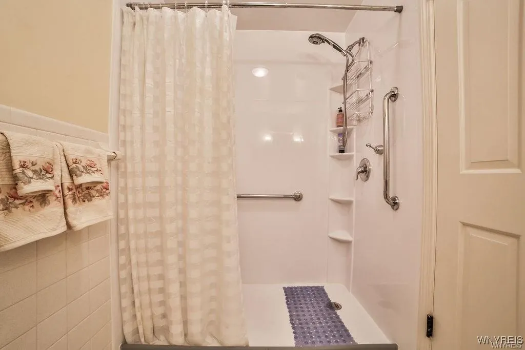 full bath with walk-in shower