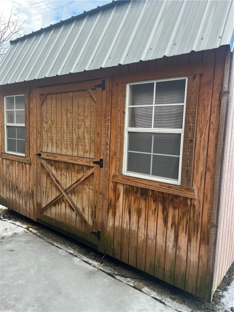 Shed comes with property.