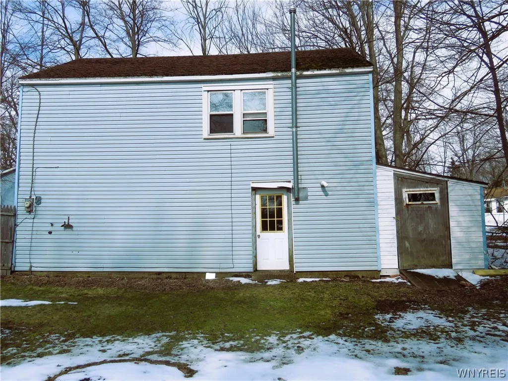 Right Side of Garage & Huge Attached Storage Shed