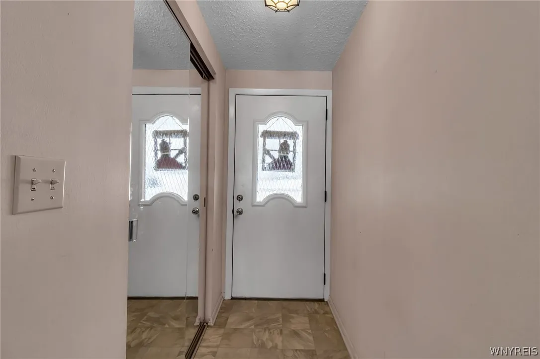 FRONT ENTRANCE AND CLOSET