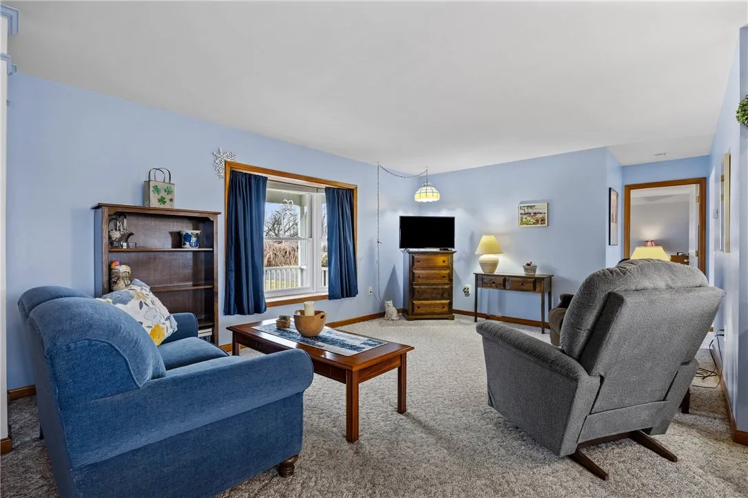 Bright and airy living room with nice bay style window