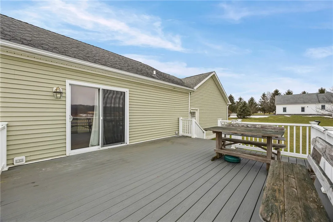 Rear deck through sliders off of the kitchen