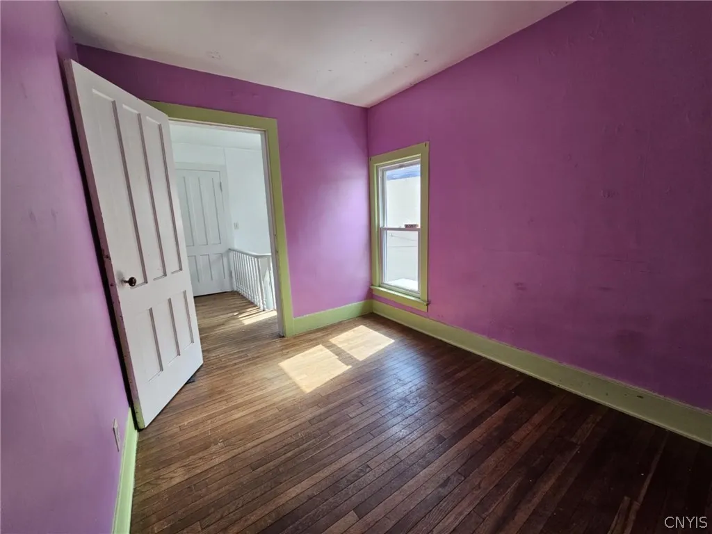 Middle bedroom/office space facing 1st entrance.