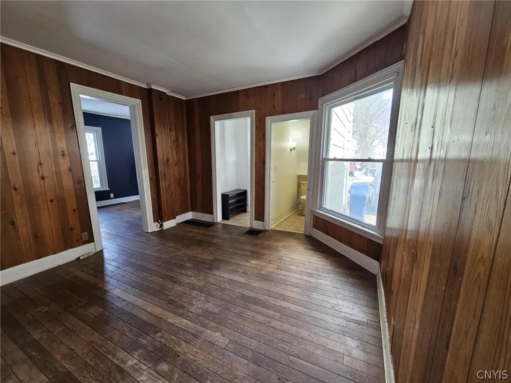 Den/office room with half bath.