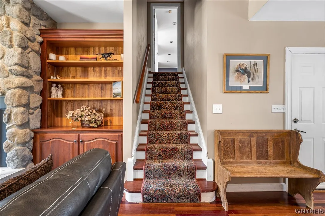 Stairway leads to Primary bed/bath North Wing
